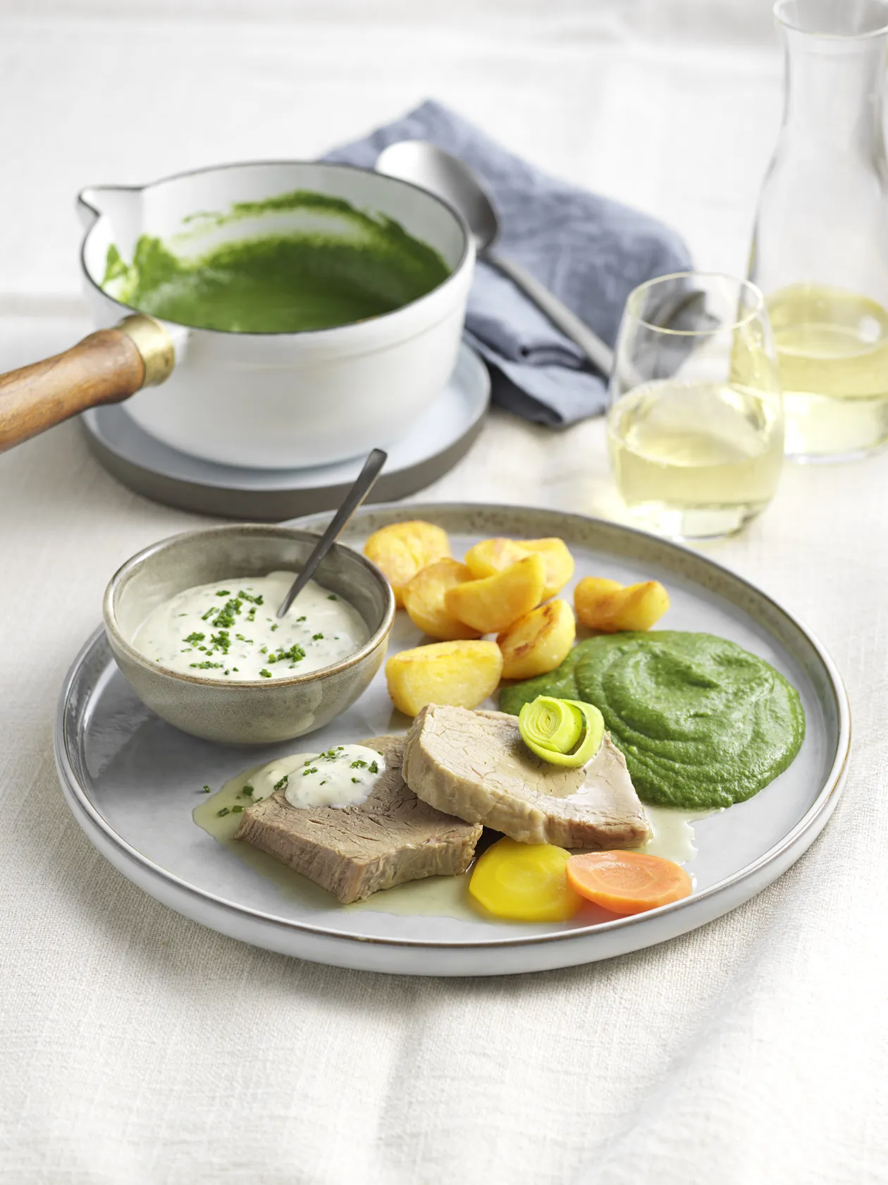 "TAFELSPITZ" VIENNESE STYLE BOILED VEAL with cream spinach, root vegetables, potatoes and chive sauce