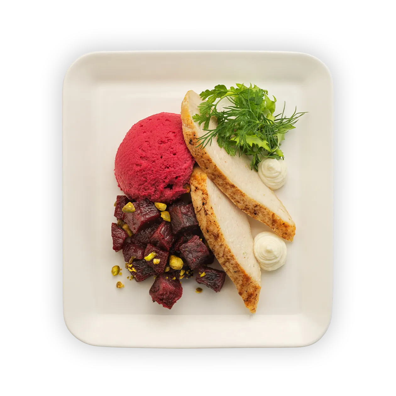 Sautéed chicken breast | beet hummus and feta cream | beet salad with lingonberry | horseradish and pistachios